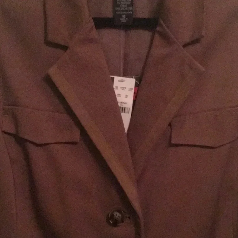 NYC sleeveless suit top and matching skirt
